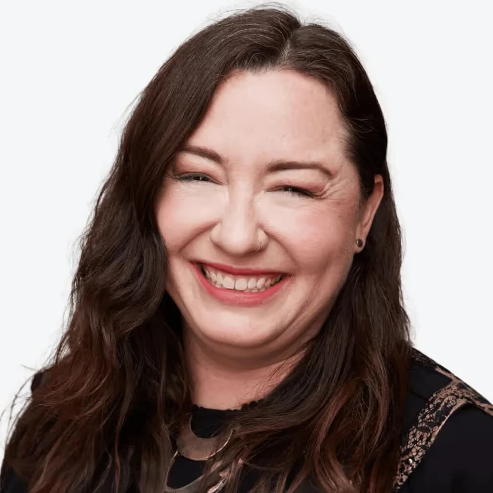 Clay professional portrait showing a woman smiling brightly