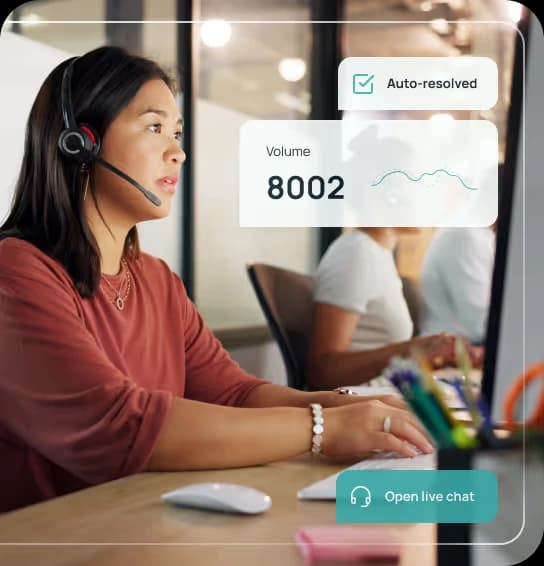 Forethought customer service workspace showing an agent monitoring 'Auto-resolved' cases and 'Volume' metrics on a modern screen.